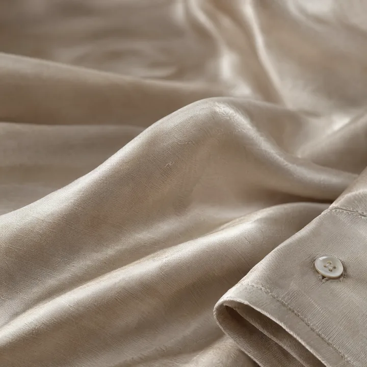 Concept render: close-up of Oat fabric and a shirt cuff
